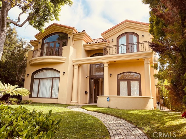 1057 Harvard Street Santa Monica, California Impressive, spacious custom-built Mediterranean villa, located in the desirable North of Wilshire neighborhood in the coveted Franklin Elementary School District, offers grand luxury on university streets. The grand foyer welcomes you with open cathedral ceiling, dazzling crystal chandeliers and stunning wrought iron spiral staircase A modern open floor plan that boasts a large formal living room and an elegant super-sized dining room A great family room that opens to the backyard is just off the gourmet kitchen that hosts granite counters, stainless steel appliances, custom cabinets, and a mini bar for entertaining. This luxurious home features 4bdrm, 5.5 bath plus library/office Main floor office with its own full bath can be used as additional 5th bedroom Upstairs there are 4 bedrooms suites all w/ their own private bathrooms and balcony overlooking a magnificent view. The spacious master suite is a resort, featuring a charming sitting area, vaulted ceilings, a custom fireplace, luxurious master bath and view Relax in your private backyard oasis surrounded by lush landscaping and mature fruit trees walking distance to Bristol Farms and many restaurants. A short drive takes you to the beach, 3rd street shopping or Brentwood Country Club