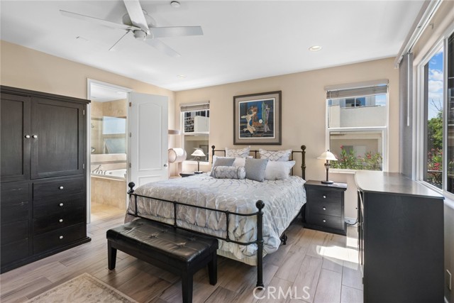 Main bedroom with en suite bath and walk in closet.