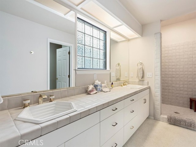 The Primary Bathroom has two showers.