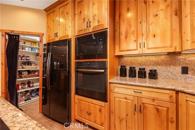Walk-in pantry and frig is included.