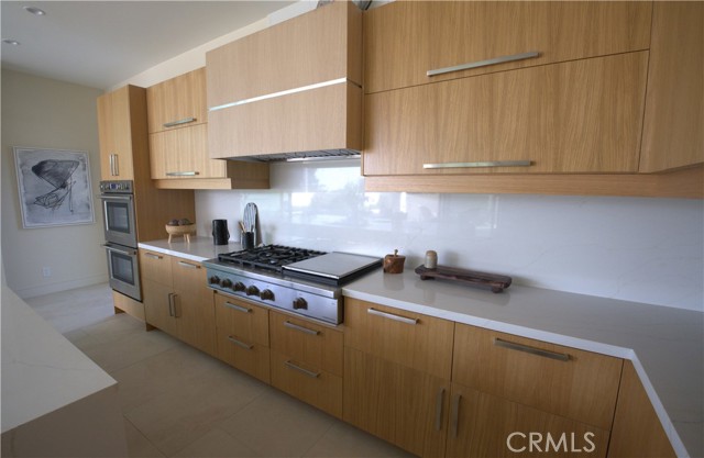 Chef kitchen w dual convection ovens 5 burner stove and flattop grill center burner for a Wok