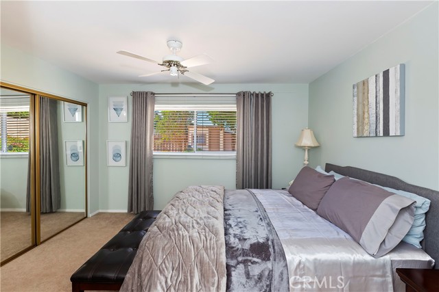 Primary Bedroom - The mirrored closet brings brightness and space to the room.