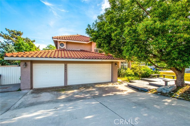 9961 Smoketree Drive Rancho Cucamonga, California Turnkey home on a half acre lot of a quite cul-de-sac. Sitting on the top of Wilson, enjoy spectacular Mountain and city light views! As you enter the home you'll be greeted by the vaulted ceiling and a warm living and dining area with elegant dark hardwood floor. Kitchen has been fully upgraded with granite counter top and upgraded stainless steel appliances. Kitchen opens to family room. One bedroom downstairs with a full bath makes a perfect guest room. There are three bedroom upstairs. From the master bedroom you are sure to enjoy the fabulous view from your private balcony. The master bath offers dual upgraded granite sinks and separate tub and shower. The other two bedrooms are spacious, with Jack and Jill bathroom in between. The backyard consists of almost half an acre, so many potentials a pool, a guesthouse, you name it! Plenty of fruit trees, lemon, orange, grape, pomegranate, etc. The home also features a 3 car garage with epoxy floors, gated RV parking and a newer water heater that has been recently installed.