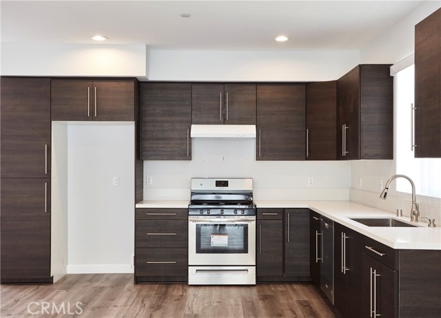 1354 9th Street W 4 San Pedro, California Brand New Contemporary Construction built with high end finishes throughout. Be the first to live in this luxurious and spacious three bedroom, two full bath home. The kitchen has brand new stainless steel appliances including a dishwasher, microwave, custom cabinets with ample storage space and a new washer & dryer in it's own closet space . The three large bedrooms each have build in closets with lighting, high ceilings with wall sconces. This four unit building has A/C in each unit, security access from the front to the rear of the complex and each unit has two parking spaces. Located in the prime Vista Del Oro neighborhood of San Pedro. Close to shopping, restaurants, the Port and easy freeway access.
