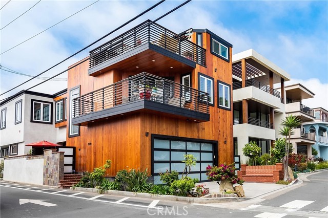2600 Vista Drive Manhattan Beach, California MASTERPIECE in Manhattan Beach with panoramic views above that! Even Leonardo da Vinci or Michelangelo could not do better! Not only can you walk everywhere: beach, parks, downtown MB, Pier, Schools, Stores, Restaurants...but above that you have panoramic views of ocean, city, Palos Verdes hill and Catalina Island!! Home is on very special, one of a kind street: cul-de-sac, park like walk street with no homes on the other side!! Entry is through private patio to Great room with hardwood floors, beamed ceilings, fireplace , open to kitchen with large middle island/counter, Kitchen opens to dining room with french doors open to front patio. The first floor has 2 bedrooms and 2 bathrooms. All built-ins and fixtures are additional masterpieces. Connected to spacious 2.5 garage. On 2nd floor is a Master Suite with a view and balcony, Family room, Laundry room and 2 additional bedrooms and fantastic full bathroom. On 3rd floor is another Family room with doors fully opening to deck with breathtaking views of ocean, Catalina, Palos Verdes hill, and city views. Doors have mechanical solar shade which open and close by remote control. There is also a 1/2 bath. Just relax,enjoy the spectacular views or lay in lounge and dream....