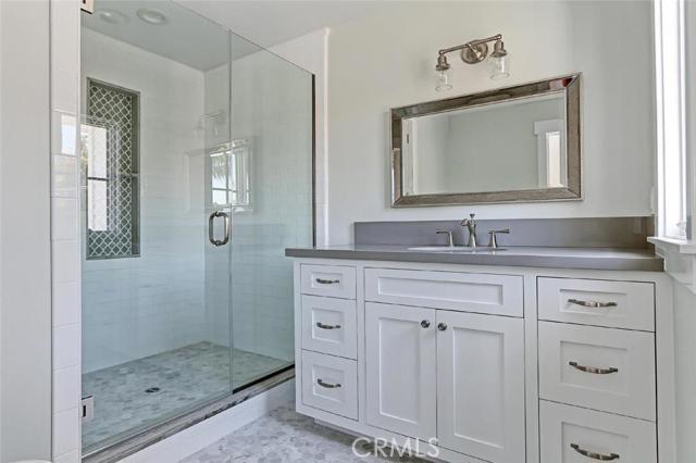 En suite bath with designer tile