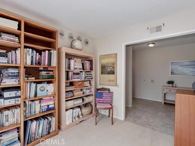 Bedroom 3 with double door entry and exit to view patio