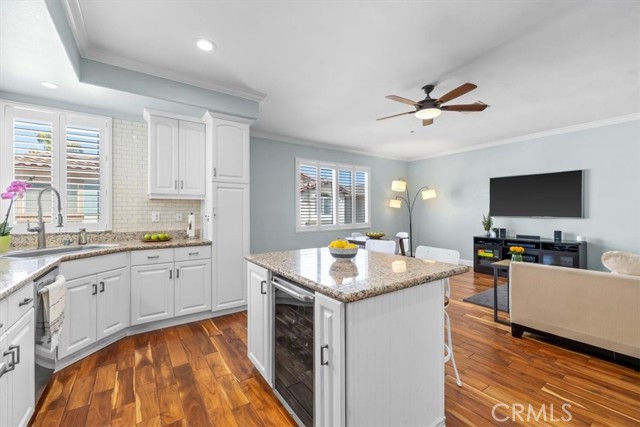 Remodeled Kitchen with island and wine refrigerator