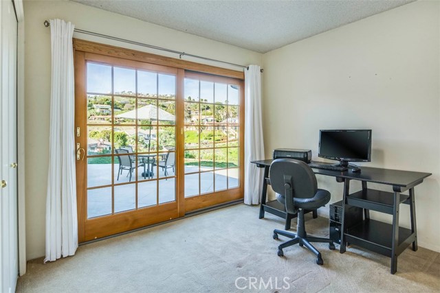 One of two bedrooms with custom closet systems