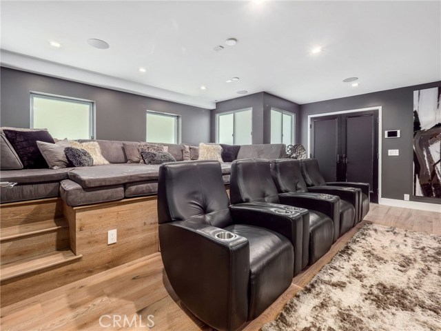 Entertainment Room with Custom Lounging Bed and additional King Size Bed Trundle.