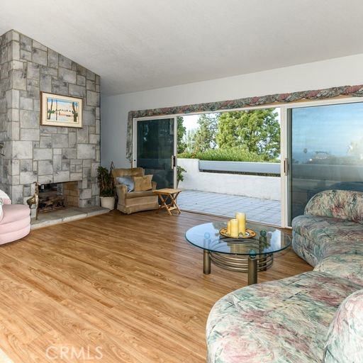 view from main bedroom looking at living room. Partial ocean view