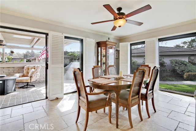 Convenient dining area opens to the first patio