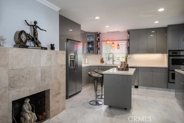 Kitchen and den.