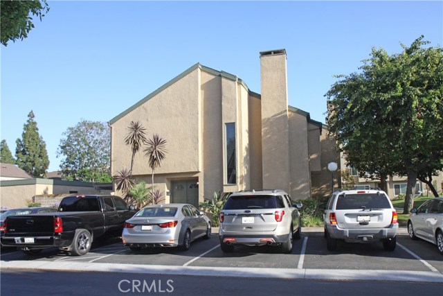 15885 Camo Bluff Court Fountain Valley, California Spectacular 2-Story End Unit Townhome in the Gated Community of Fountain Park, Directly Across the Street from Mile Square Park, Home to Golfing, Lake, Sports Complex, Recreation Center, BBQ's Walking Paths, and City Activities. This Upgraded Home Features 3 Bedrooms, 2.5 Baths, 1,402 Square Feet, 2 Car Garage, Double Door Entry to Tiled Foyer, New Carpet and Paint, All Dual Pane Windows and Sliders, Custom Blinds, Recessed Lighting, Smooth Ceilings, Ceiling Fans, Raised Panel Interior Doors and Closet Doors, Chair Railing, High Baseboards, and Inside Laundry. It Boasts a Large Living Room with Tiled Fireplace with Mantel, a Remodeled Kitchen with Granite Countertops, Custom Wood Cabinetry, Tiled Flooring, Walk-In Pantry with Etched Glass Door, and Stainless Appliances (Gas Stove, Microwave, Dishwasher). The Kitchen is Open to a Very Spacious Dining Room with Tile Flooring and Sliders Leading to a Large and Lovely Patio with Interlocking Paver Decking and Patio Cover. Upstairs is a Very Large Master with His and Hers Closets, 2 Spacious Secondary Bedrooms, and a Jack & Jill Bathroom with a Tub/Sher Combo Plus a Walk-In Shower & 2 Separate Vanity Areas. Popular & Highly Rated Thomas Paine Elementary School, Sarah McGarvin Intermediate School, and La Quinta High School (Great Schools ratings of 8, 9 and 9, respectively). Conveniently Close to Shopping, Restaurants, Schools and Freeways. Short Drive to Beach.