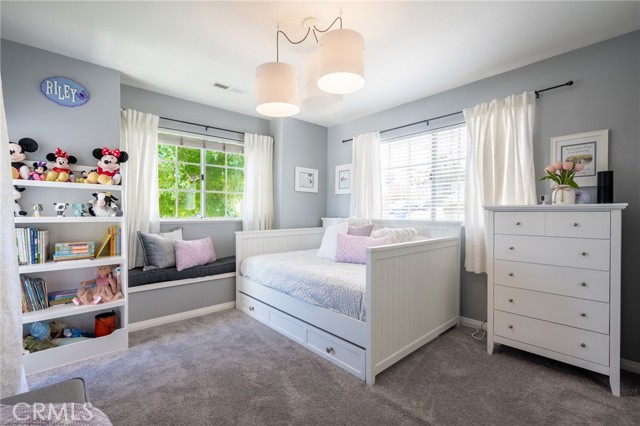 2nd guest bedroom with access to balcony