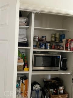 Large double door pantry/utility closet in the hall.