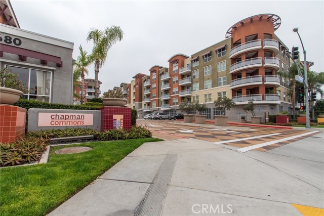 12668 Chapman Avenue 2202 Garden Grove, California Welcome to Chapman Commons. An opportunity awaits to live in a highly maintained and well kept community that offers resort like amenities. This interior unit offers two spacious bedrooms and 2 full sized bathrooms. The unique location allows for private views in the balcony off the living room.
The Kitchen is fitted with granite counters and modern appliances including a refrigerator. The open living and dining area is fitted with wood floors. Newly installed blinds dress up all windows. Unit is equipped with stacked washer and dryer in a separate laundry closet. Community amenities include swimming pool, spa, barbecue area, fire pit, multi-purpose function room, and a separate gym overlooking the pool. 2 parking spaces assigned. Conveniently located close to freeway, shopping and dining.