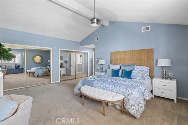 Owner's Suite with beamed/cathedral ceiling