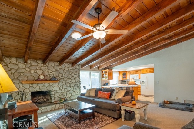 Family room open to kitchen and dining room.