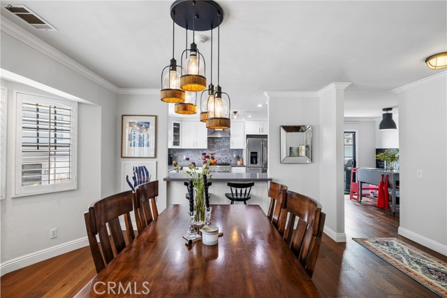 Spacious dining with high ceilings.