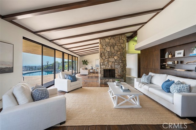 Living Room Flows from Dining Room into Family Room