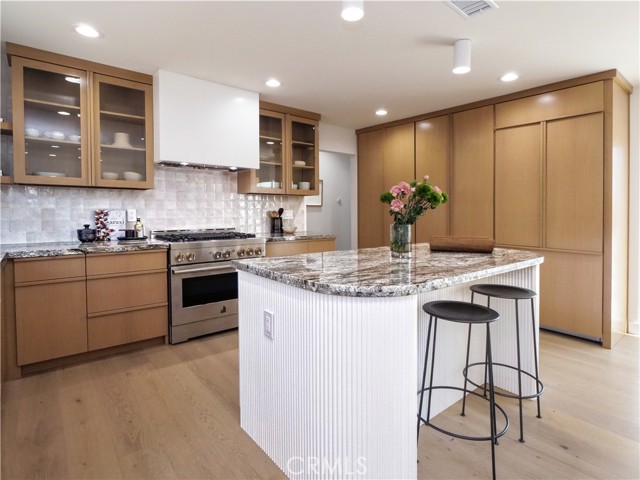 Beautiful kitchen with high end appliances and kitchen island