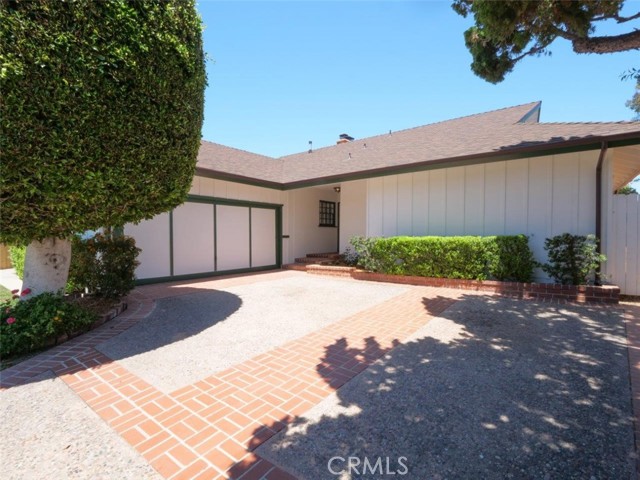 Continue the tour to  the wonderful front freshly painted exterior in white with green trim.