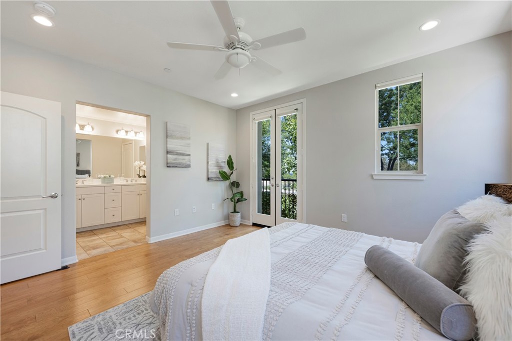 Master Bedroom has tons of Natural Light and an attached En Suite!