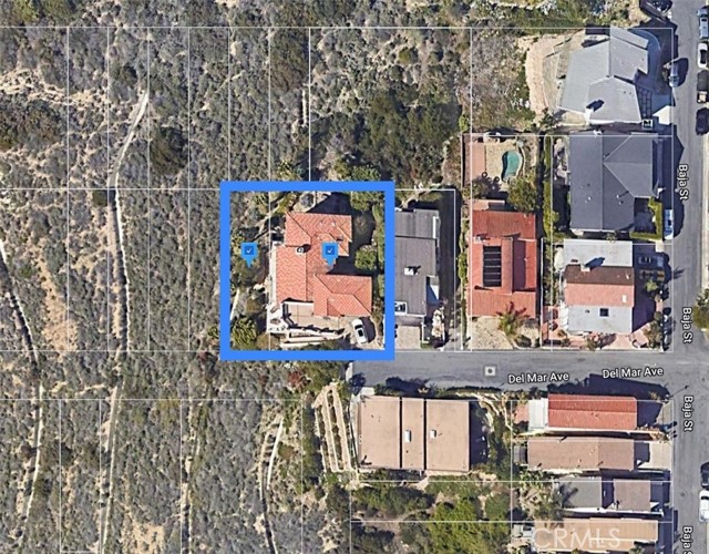 Settled at the end of a cul-de-sac, the home offers a private setting that includes two parcels in its price.