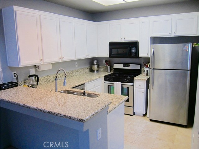 Upgraded kitchen with brand new dishwasher last month. Refrigerator is the tenants but you can buy it for you client for $150 as their closing present!