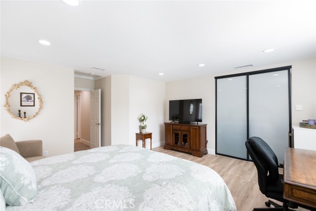 Behind the closet doors of the 3rd bedroom are a pair of French style doors that lead to the side yard. Since the room is assessable without going through the main house, it offers lots of possibilities.