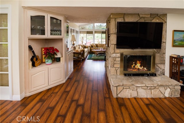 Family Room, TV over Fireplace.  Living Room at back