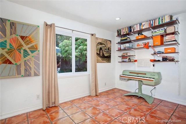 Bedroom #3 with window to back yard.