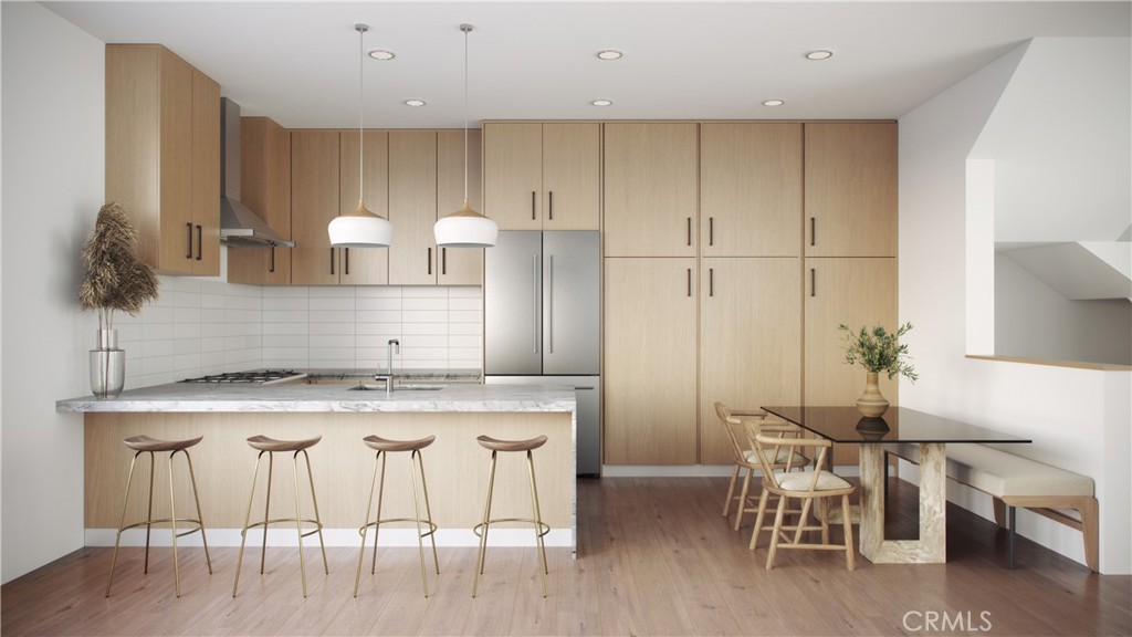 Kitchen and dining areas. All renderings are conceptual only. Subject to change.