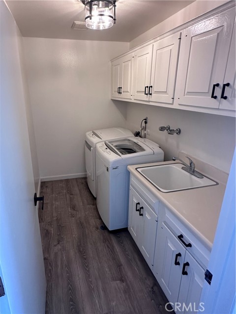 Third Floor Laundry with sink and countertop.