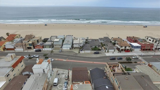 2704 Hermosa Avenue Hermosa Beach, California NEW PRICE- MOTIVATED SELLER Welcome to the Beach Lifestyle of North Hermosa Beach. This home is a gem, located on the quiet part of Hermosa Avenue, directly across from the Strand, in the North Sand Section of Hermosa Beach. This corner lot property has Ocean Views from the main living area and offers the opportunity to enjoy one of kind California sunsets. It sits literally steps from The Strand, sand and beach. This charming home is well maintained and features and a lot of character. Large two car garage with laundry, plenty of storage and direct access into the home.