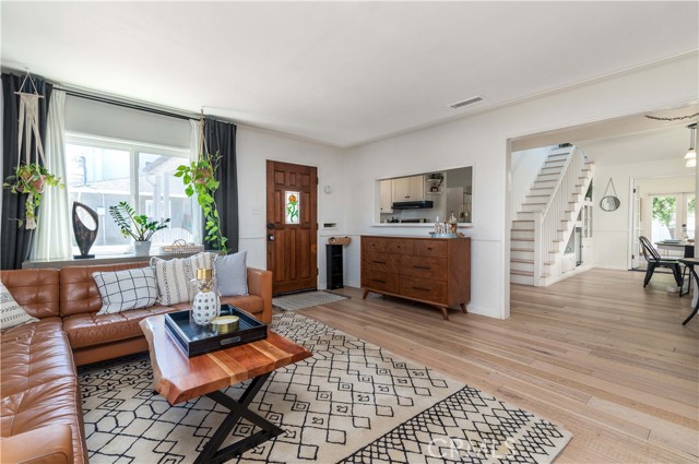 Formal living room with custom entry door