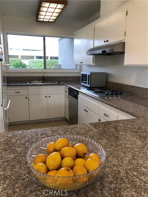 Cherry expansive kitchen to spread out in!