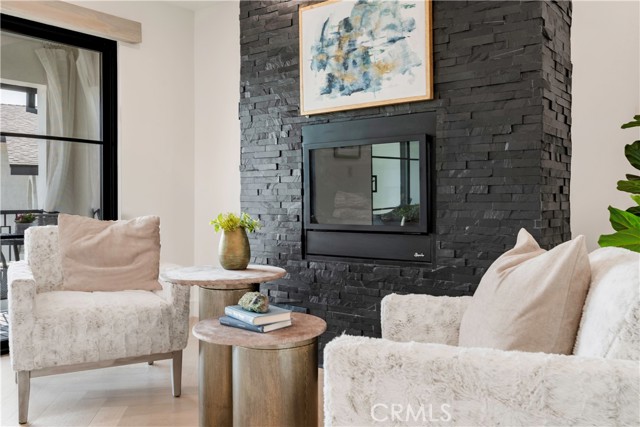 Primary Bedroom sitting area / Fireplace