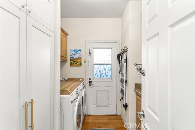 Laundry Room with cabinets for storage