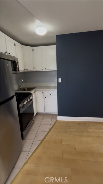 1036 S Normandie Avenue, Los Angeles CA: https://media.crmls.org/medias/52a59c10-9966-4bcf-b530-fc5ced6918f8.jpg