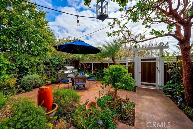 Private gated entrance patio with fountain, brand new BBQ, al fresco dining.