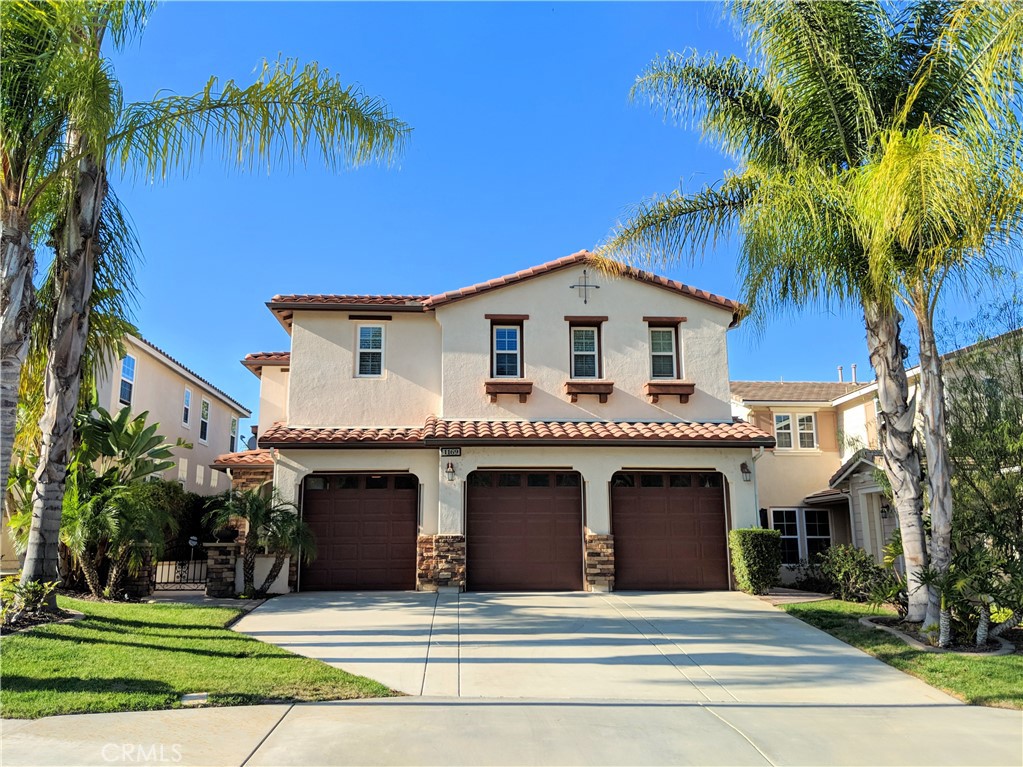 Located in the exclusive and sought-after Arrowood community, this stunning 4-bedroom, 3-bathroom home offers 3,075 square feet of thoughtfully designed living space and a spacious 3-car garage. A downstairs bedroom and full bathroom provide ideal flexibility for a home office, hosting guests, or multi-generational living. Step inside to a bright, airy formal living room, an open dining area, and a comfortable family room with a cozy fireplace, perfect for relaxing evenings or entertaining. The oversized kitchen is a chef’s dream, featuring granite countertops, stainless steel appliances, a large center island with bar seating, a pantry, and ample cabinet storage. Upstairs, a generous loft offers the perfect setup for a second living room, workspace, or playroom. The expansive primary suite boasts a large walk-in closet, dual vanities, a jetted soaking tub, separate shower, and picturesque sunset views right from your windows. Two additional bedrooms share a hall bathroom with double sinks, and a dedicated laundry room adds everyday convenience. The private backyard is a peaceful retreat with a lush lawn, mature palms, and no direct neighbors behind, ideal for enjoying sunsets and outdoor gatherings. As an Arrowood resident, you'll have access to resort-style amenities including scenic walking trails, a junior Olympic-sized swimming pool, clubhouse, and playground. The home is located within the award-winning Bonsall West Elementary boundary and offers convenient access to the 18-hole Arrowood Golf Course designed by Ted Robinson Jr. plus parks, shopping, dining, and major freeways. Available for move-in June 1. Don’t miss the chance to enjoy the best of Oceanside living in one of its most prestigious communities.