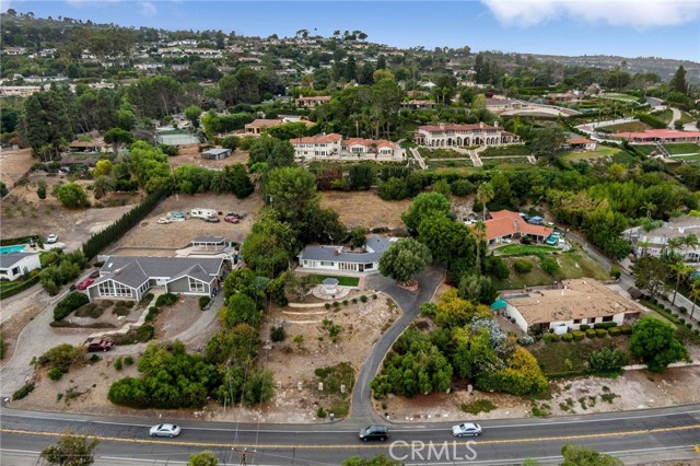 Front view of Home and vacant lot.