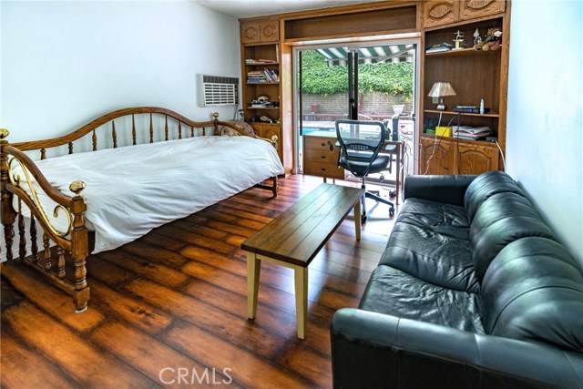 Bedroom.  Pool in background