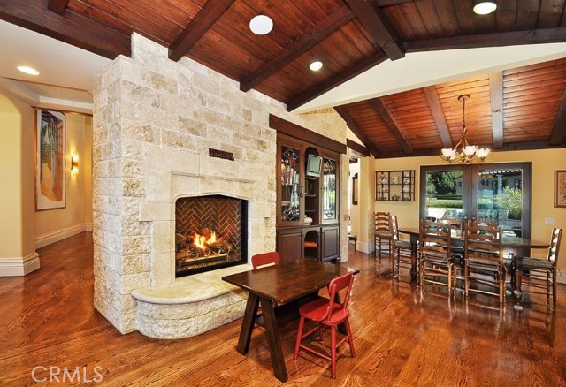 Fireplace and eating area adjacent to the kitchen