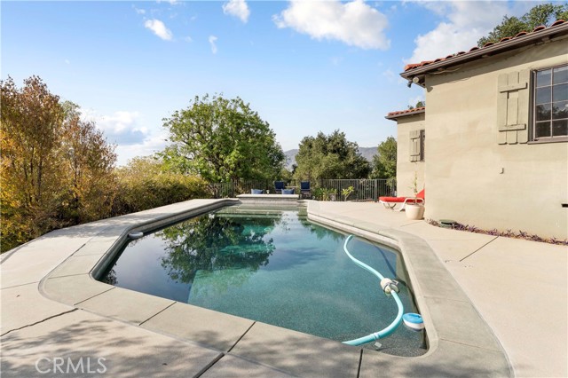 Swimming pool with large swim step. Great mountain views from the pool area.