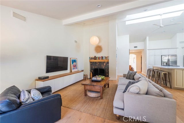 Cozy fireplace and vaulted ceilings