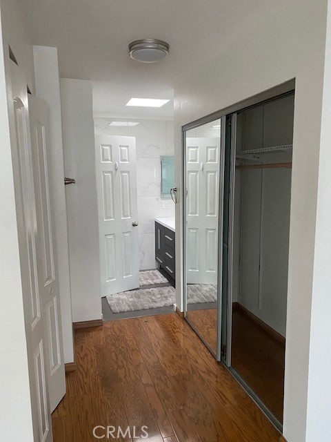 Hall with closets to master bathroom