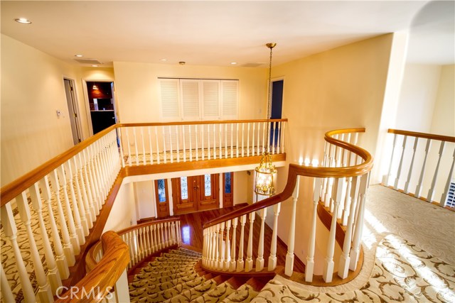 Elegant woodwork and very nice carpet on the staircase